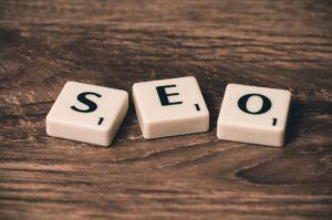 This is a photo of 3 puzzle pieces that read SEO.